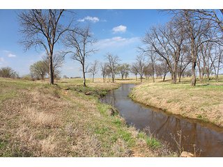 Tract 16 - LAND & MINERAL ACRES OKLAHOMA AUCTION, 588+/- Land & Producing Mineral Acres offered in 24 Tracts in Okmulgee County